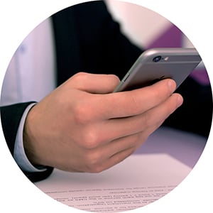 The picture of businessman with iPhone